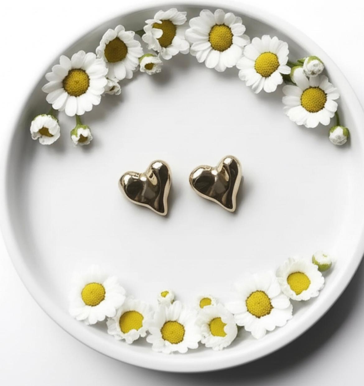 Puffed heart-shaped stud.