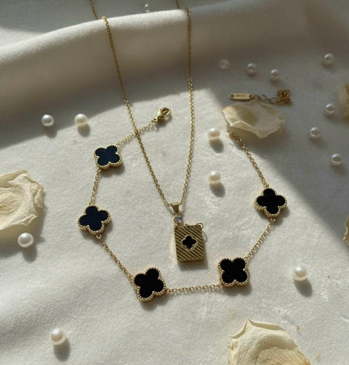 Black Clover Gold Necklace & Bracelet Set.