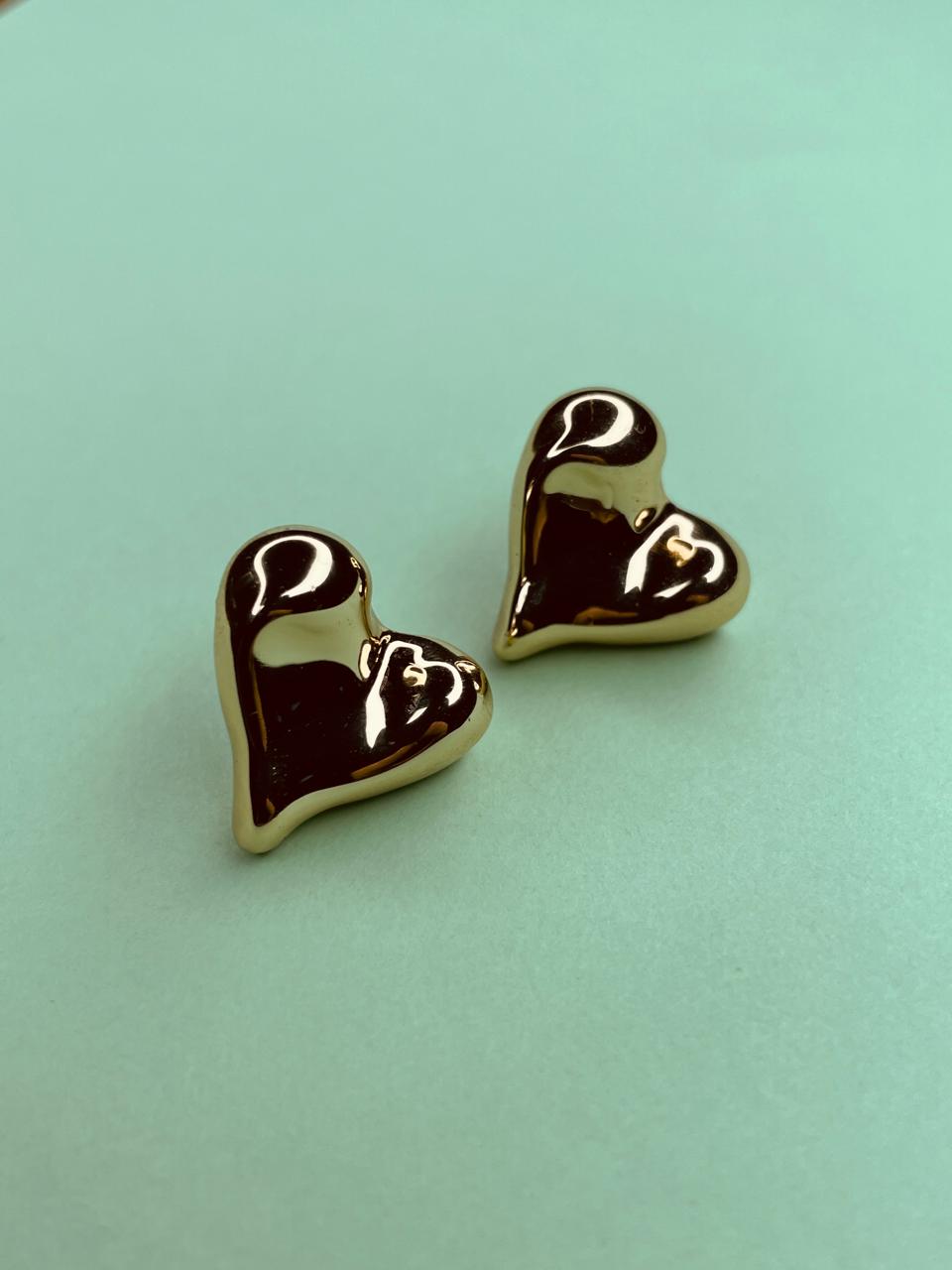 Puffed heart-shaped stud.