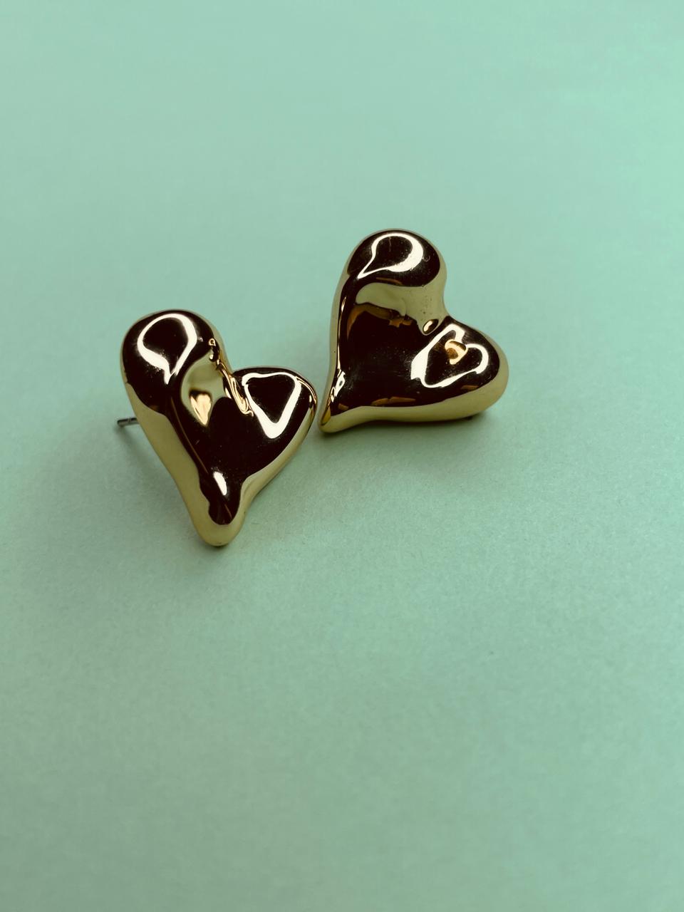 Puffed heart-shaped stud.