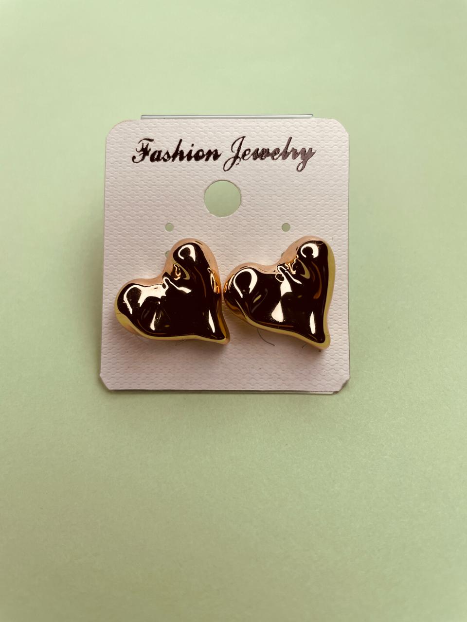 Puffed heart-shaped stud.