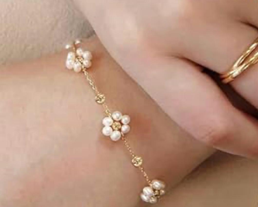 White Color Flower Bracelet.