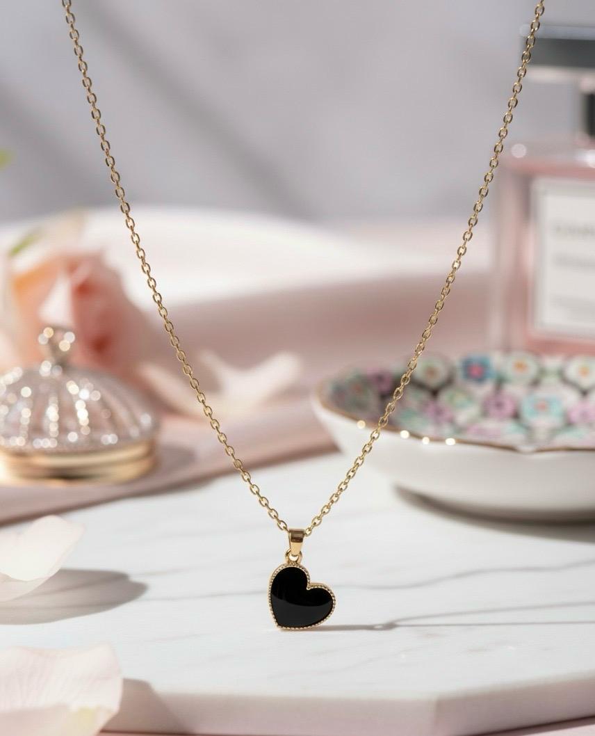 Gold Chain with Heart Charm.