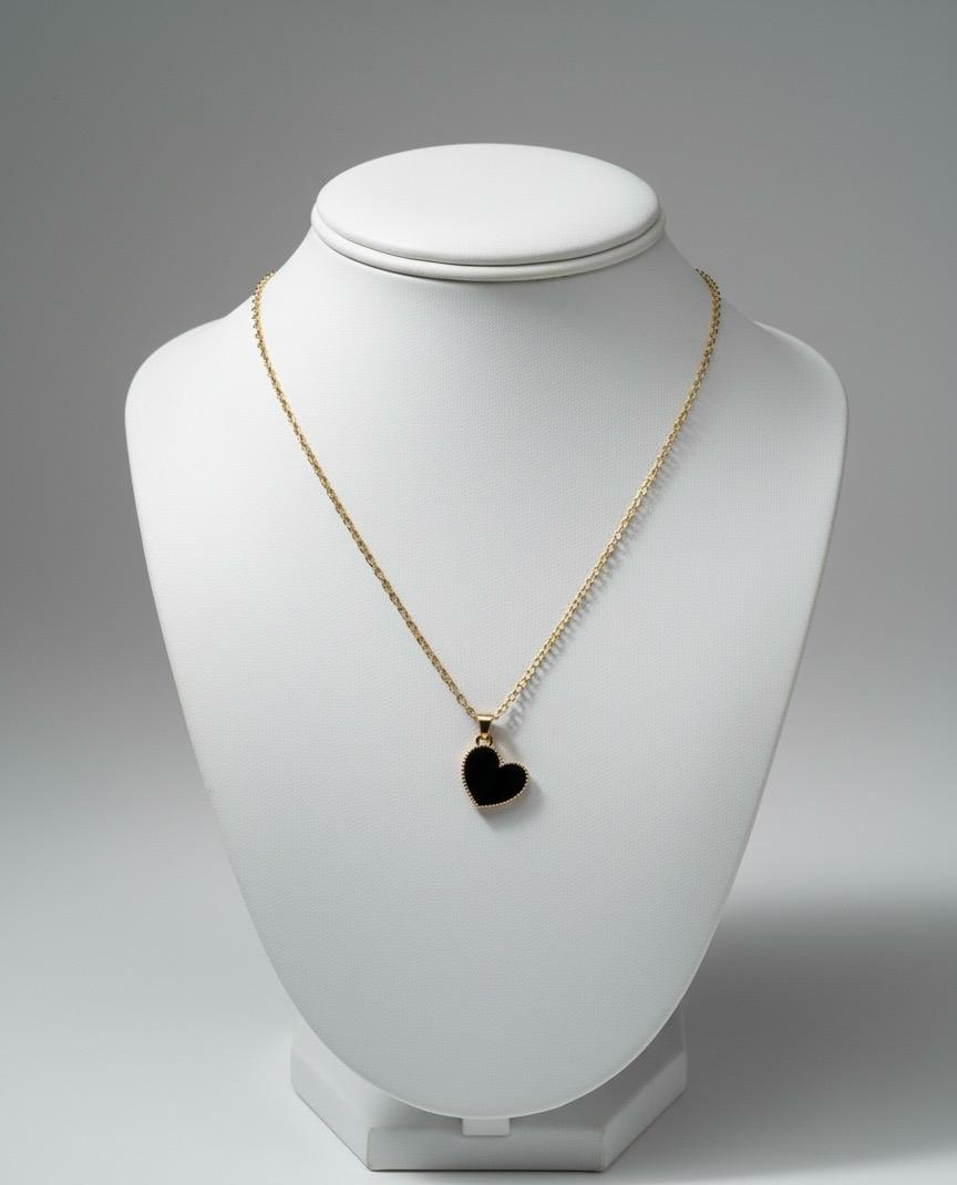 Gold Chain with Heart Charm.